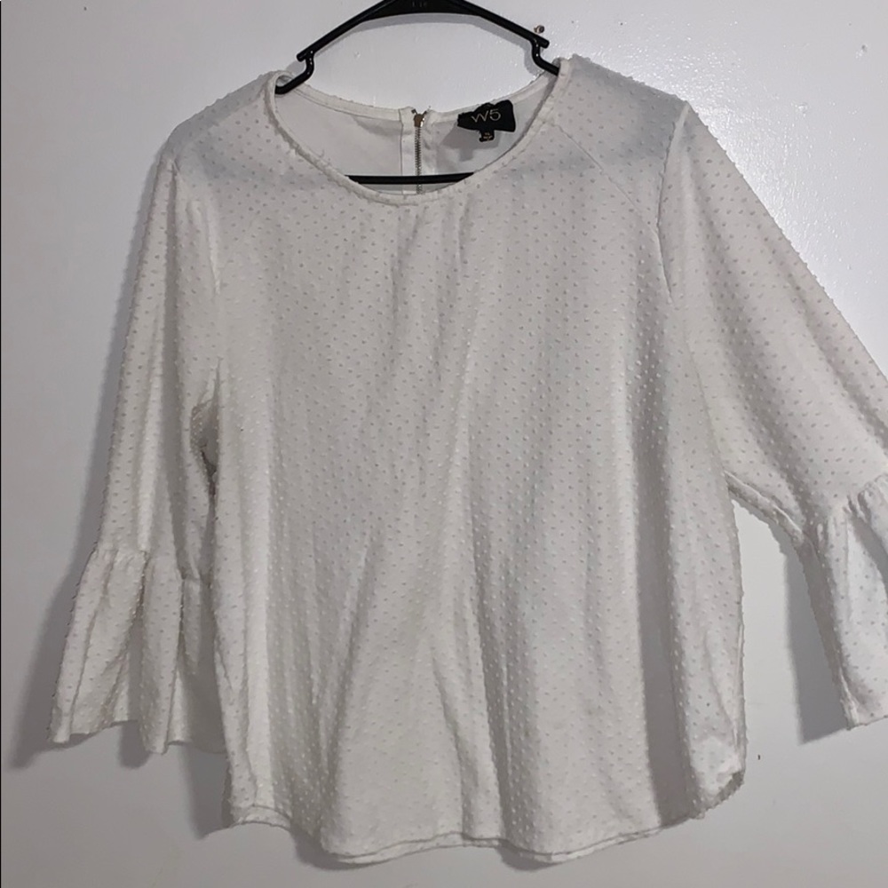 A white polka dotted shirt